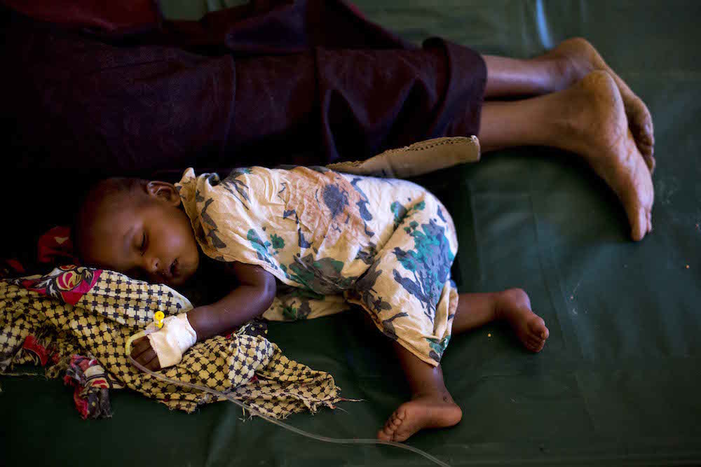Hafsa Aged 14 Months Sleeps Beside His Grandmother He Is Being Treated For Actue Watery Diarrhoea In Baidoa