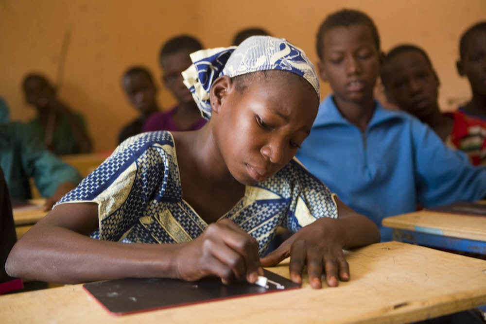 Mali Student Adaoula Concentrates During A Lesson