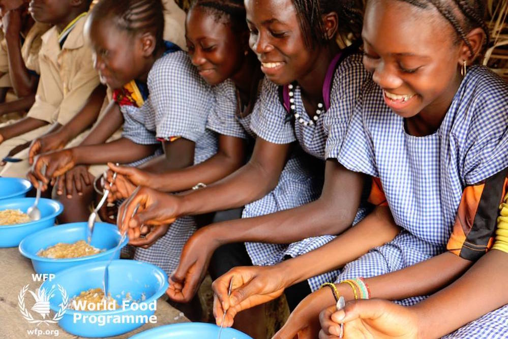 Girls Eat School Meals In Guinea