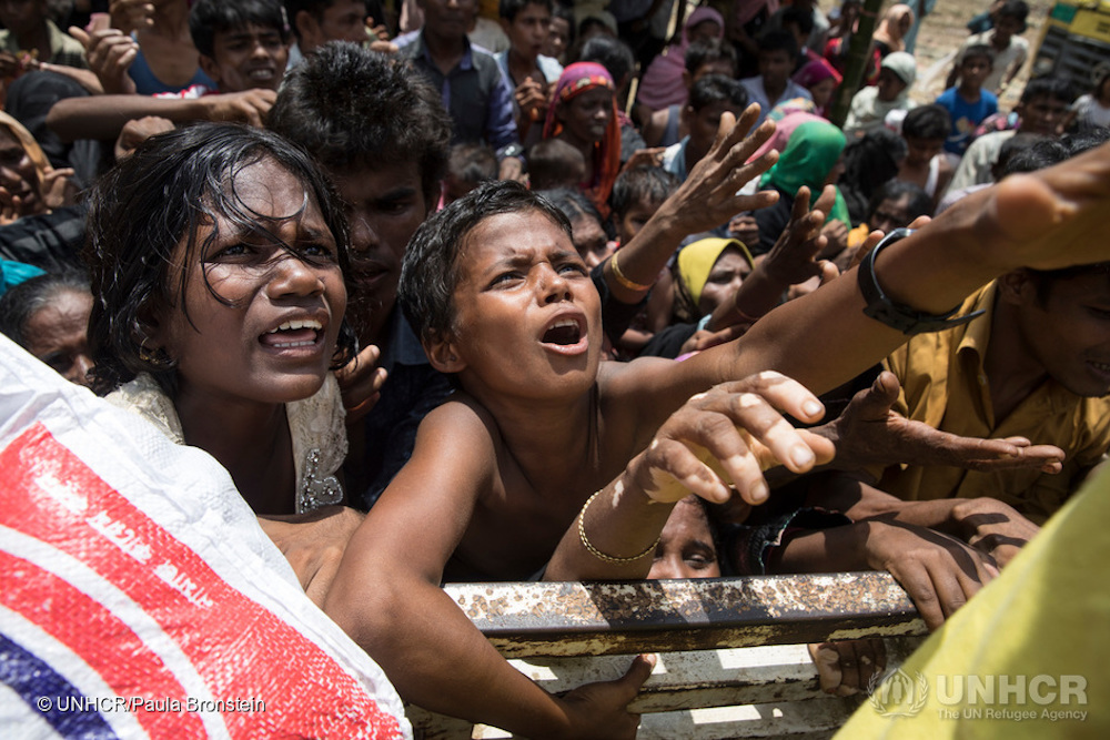 Rohingya Refugees Wait For Supplies At A Camp In Bangladesh