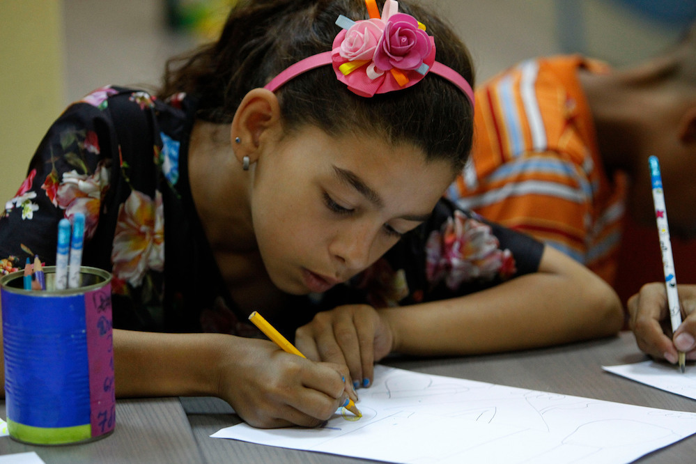 Bulgarian Roma Girl Aged 10 Draws At A Child Zone Supported By Unicef In Sliven