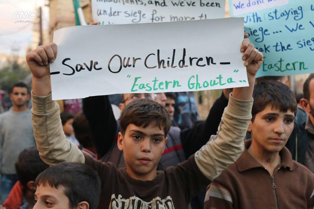 Syrian Children Show Their Message To The World In Eastern Ghouta