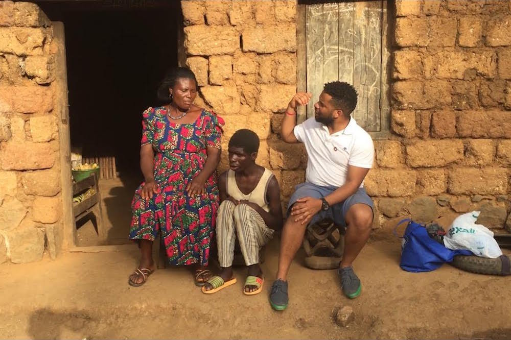 Gya Joannes Pauluas Yimbesalu With Elvis And His Mother In Cameroon Village
