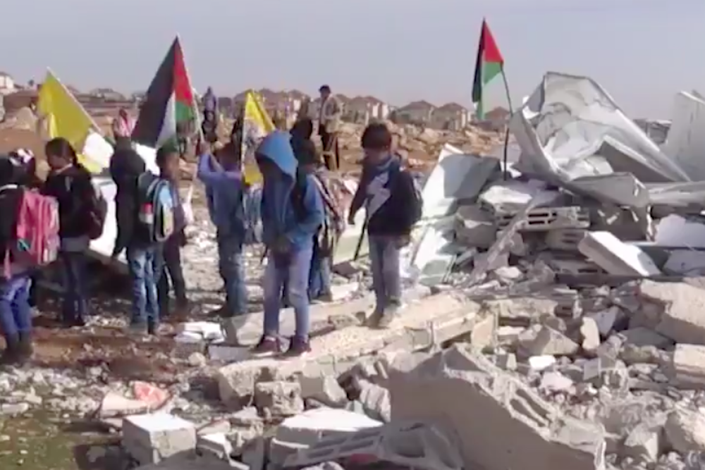 Bedouin Children Protest In The Rubble Of Their Destroyed Classrooms At Abu Nuwar West Bank