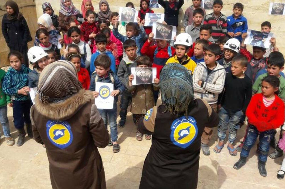 Civil Defence Womens Group Teaches Schoolchildren About Danger Of Unexploded Bombs And How To Deal With Air Strikes