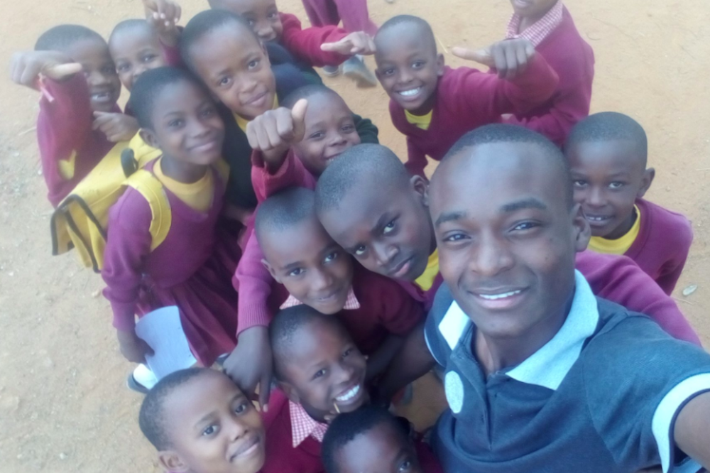 Gya Saul Paul Mwame From Tanzania With School Children