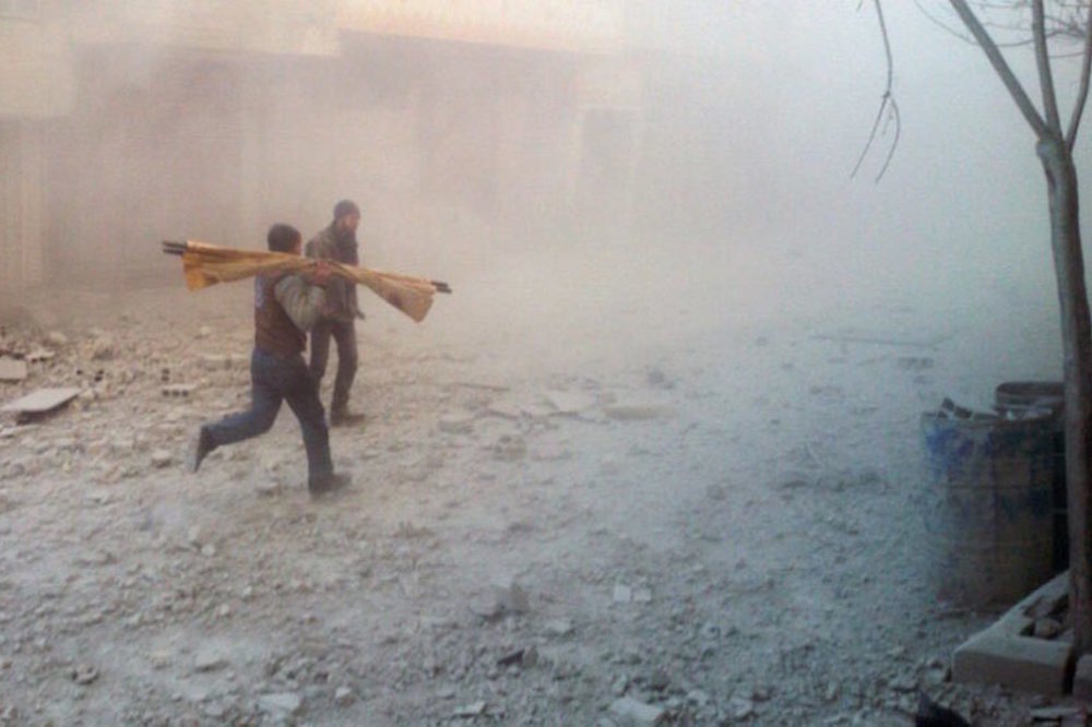 Rescuers Run To Syrian School Hit By Air Strike In Arbin
