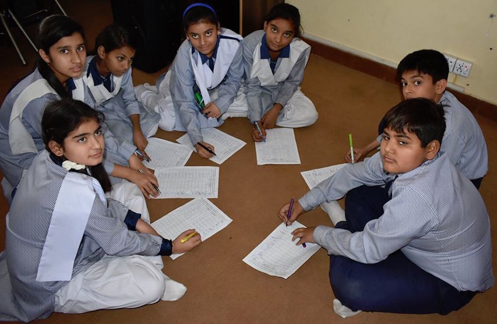Children In Pakistan Sign The Petition Through Ita
