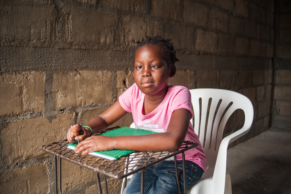 A brain tumour caused Muzna to lose her sight