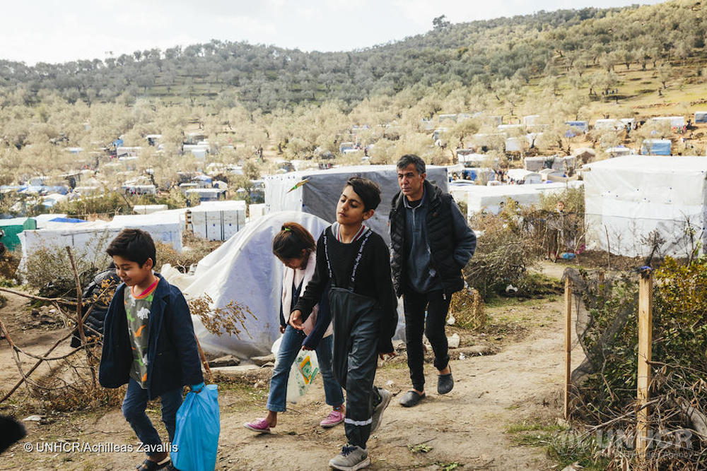 Afghan Family Collect Water Near Moria Camp On Lesvos