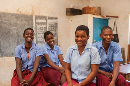 Malawi child bride Salome Mbughi with her school friends picture by Tearfund/Chris Hoskins