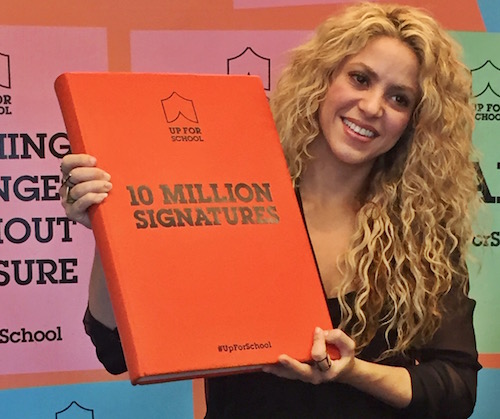 Shakira with #UpForSchool Petition book in New York