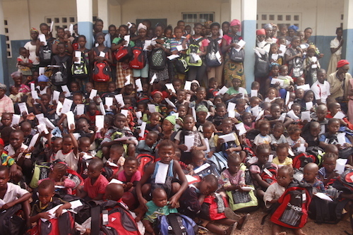 Sierra Leone Ebola orphans with donated school bags and supplies