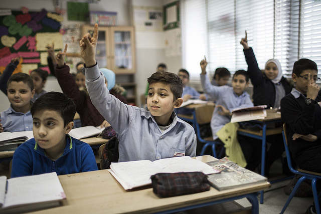 Syrian and Lebanese students sit together in classes at a mixed Elementary public school in Beirut Lebanon picture by Adam Patterson Panos DFID
