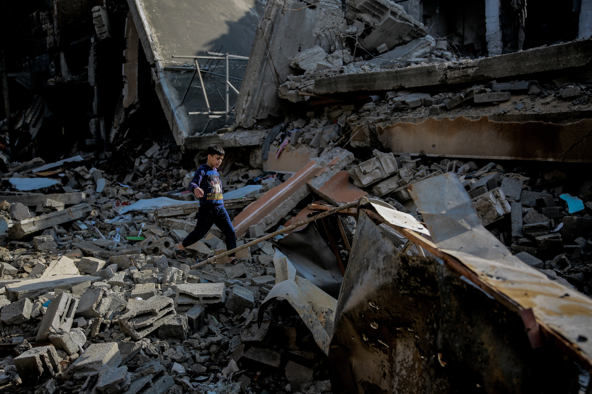 The conflict in Gaza is one of the events that have disrupted education across the world in recent months. Here nine-year-old Mohammed walks over the rubble of his destroyed home. He said: 